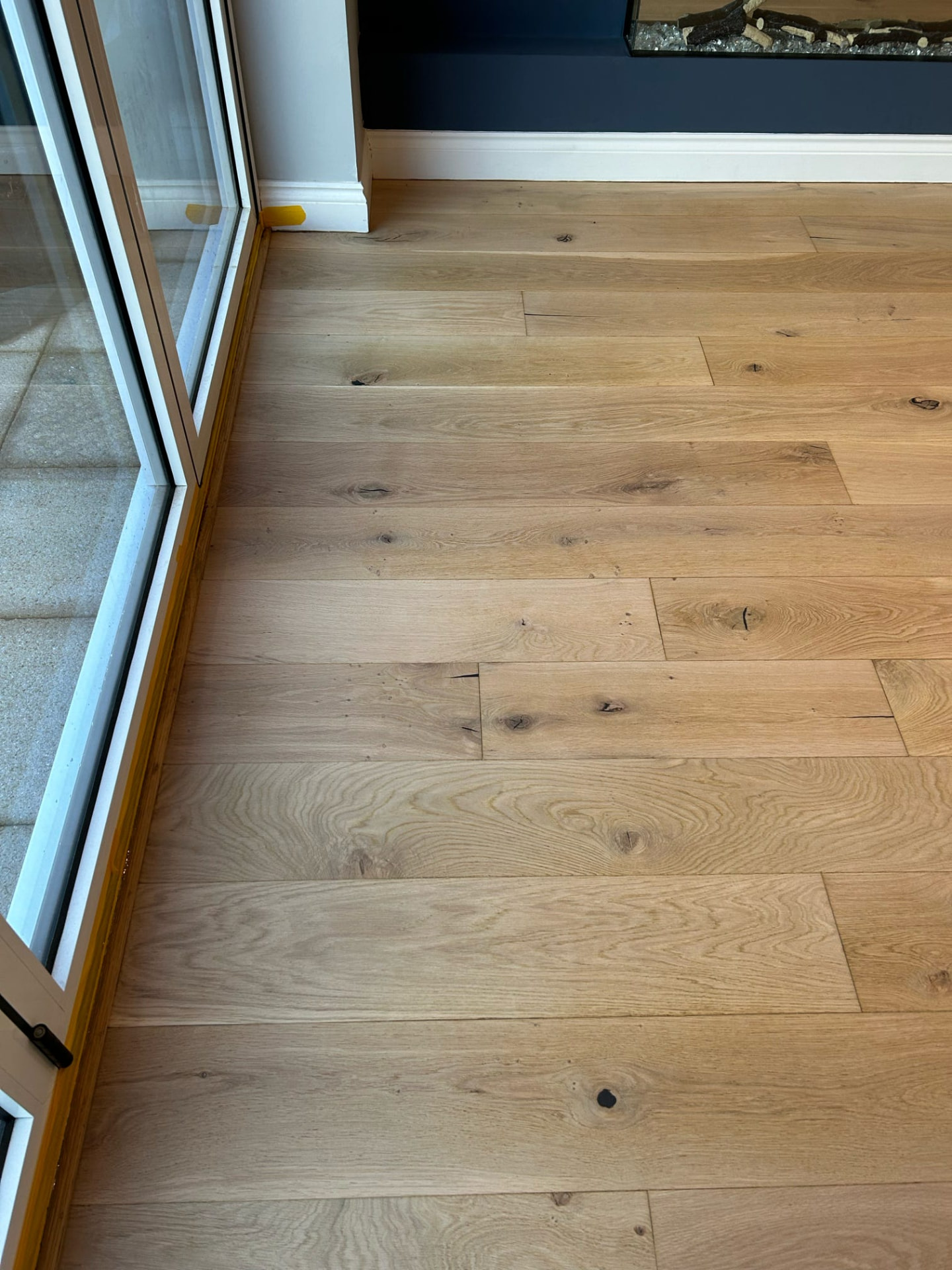 Oak floor by patio doors after sanding and refinishing