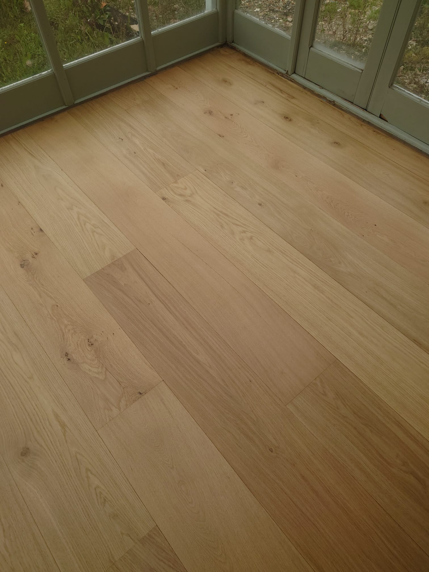 Conservatory wooden floor after sanding and refinishing